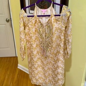 Lilly Pulitzer: Beige color with gold embroidery, fits over the knee.